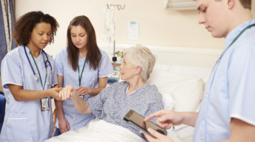 Nurses caring for patient